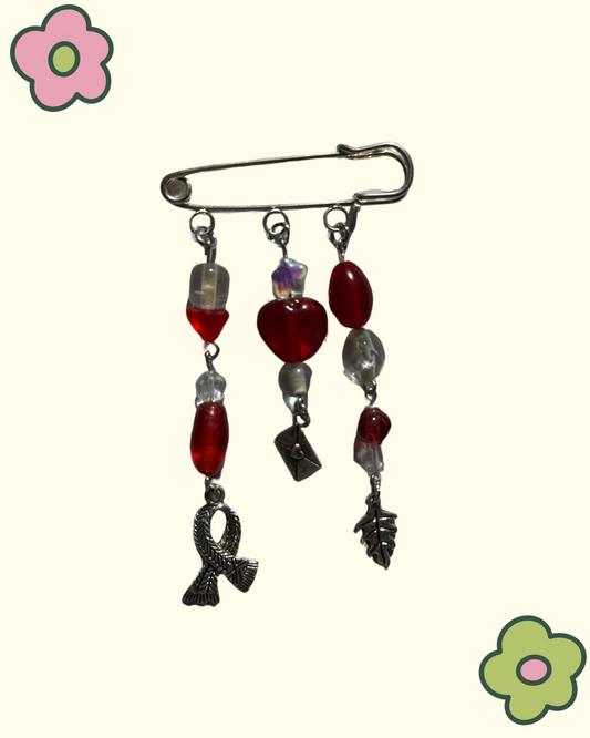 red safety pin